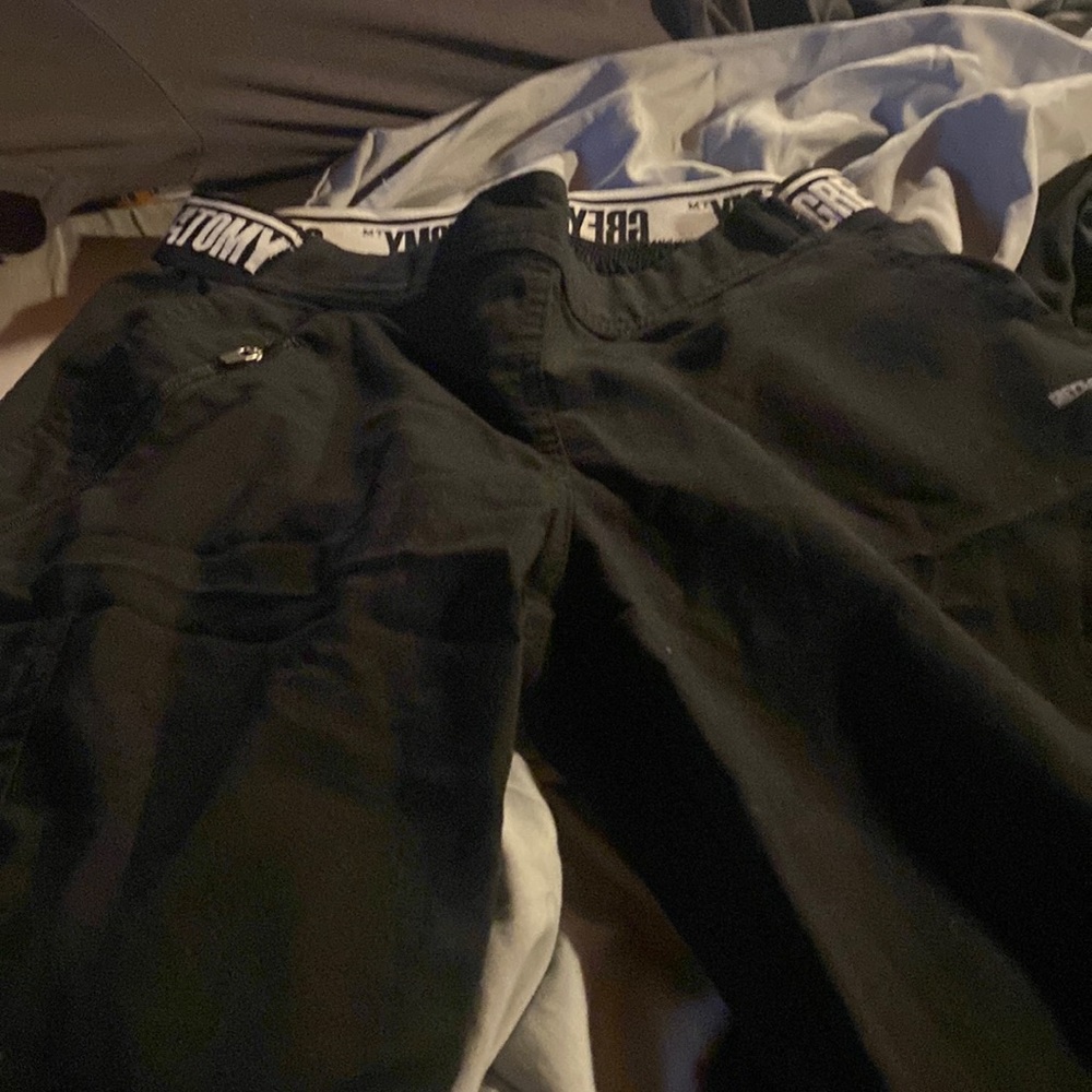 Greys Anatomy black cargo scrubs in xs. Worn a few times